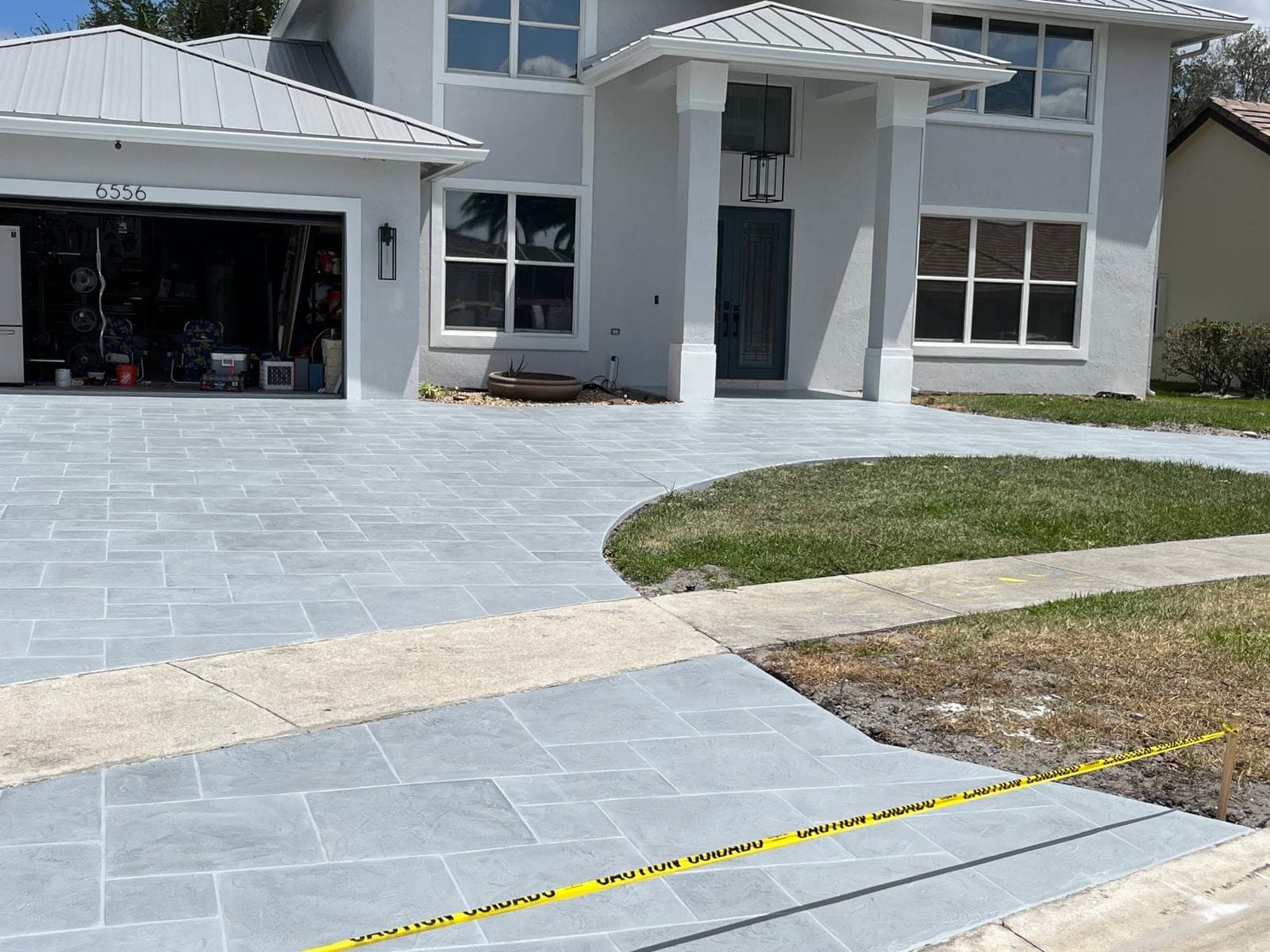 Blue-grey stamped tile driveway transformation