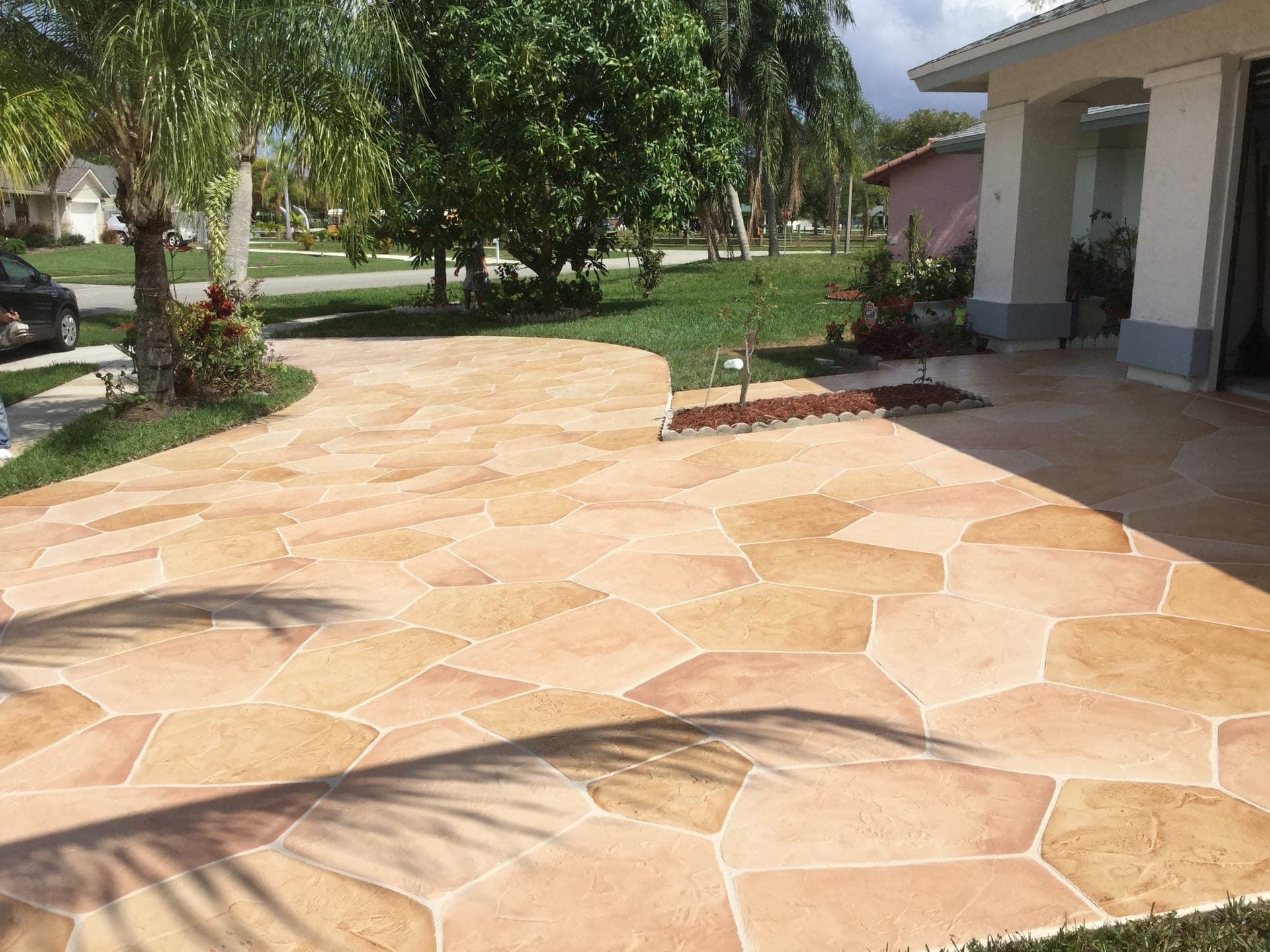 Curved flagstone driveway installation