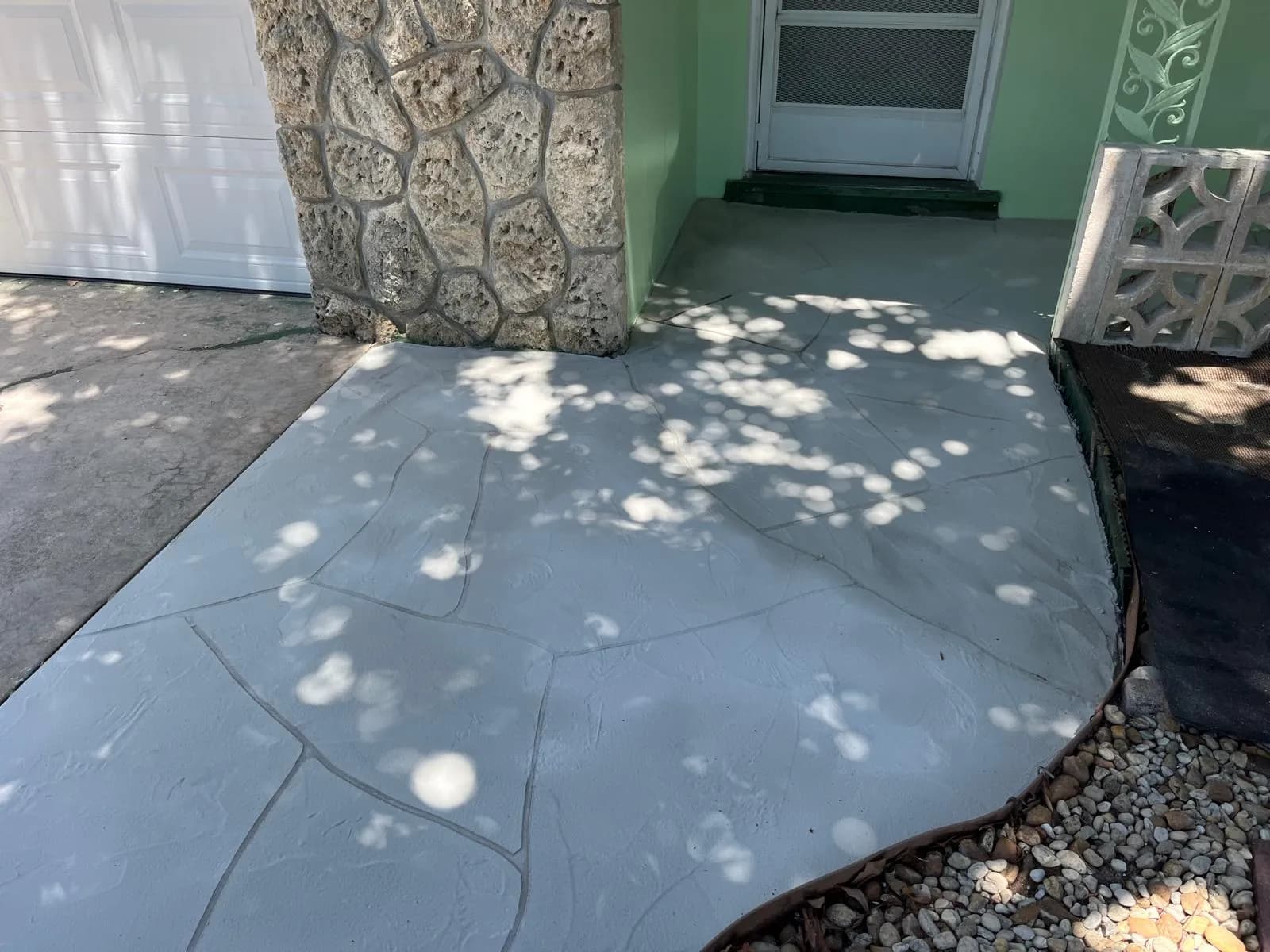 Freshly sealed decorative concrete overlay