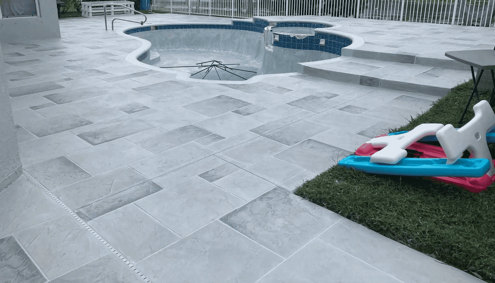 Sealed concrete pool deck