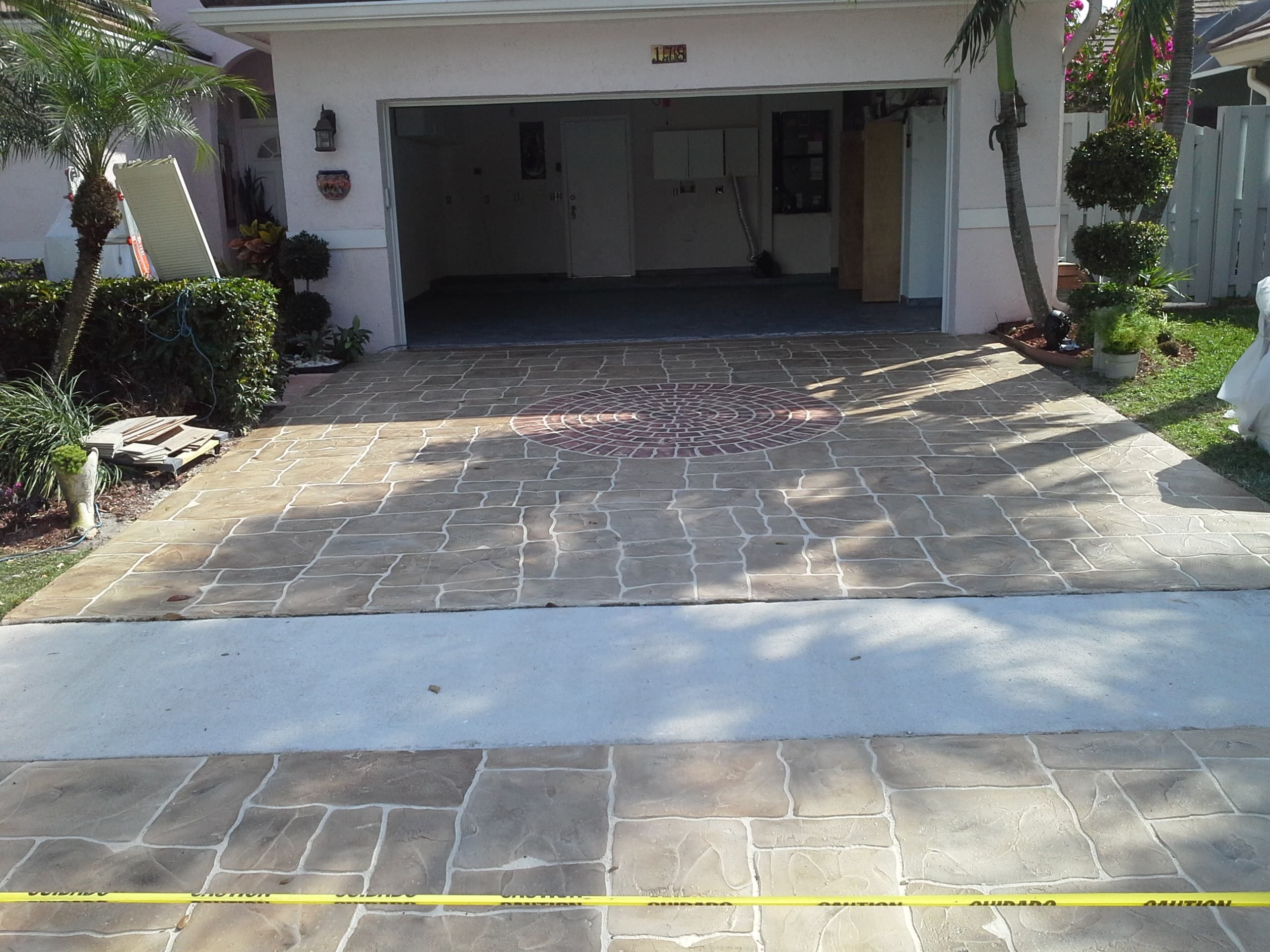 Stamped driveway with decorative medallion
